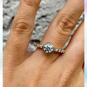 Beautiful .80 carat moissanite 10k yellow gold Size 6.5